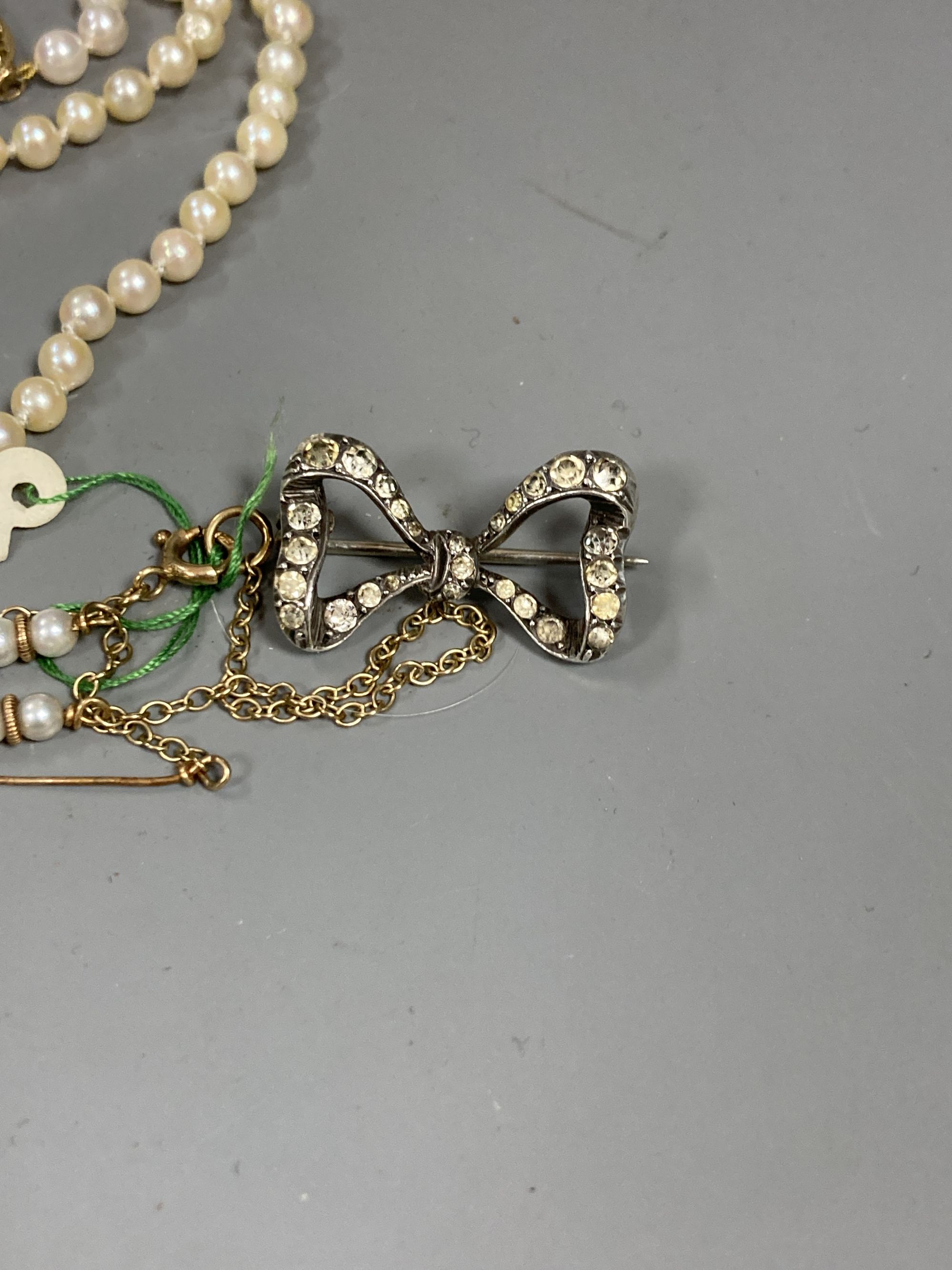 Four assorted modern single strand cultured pearl necklaces, longest 83cm, one other 9ct and cultured pearl necklace(a.f.) and two simulated pearl necklaces.